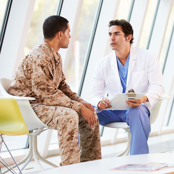 veteran talking with doctor